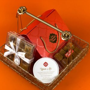 Luxurious gift basket with chocolates, sweets, and pralines, perfect for special occasions.